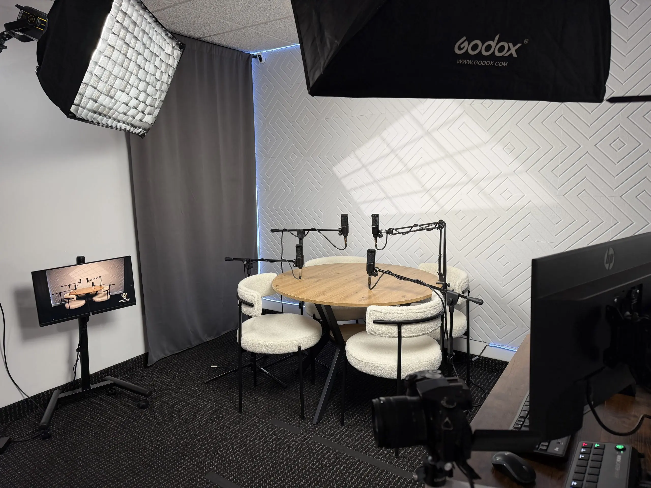 Four-person podcast recording studio setup