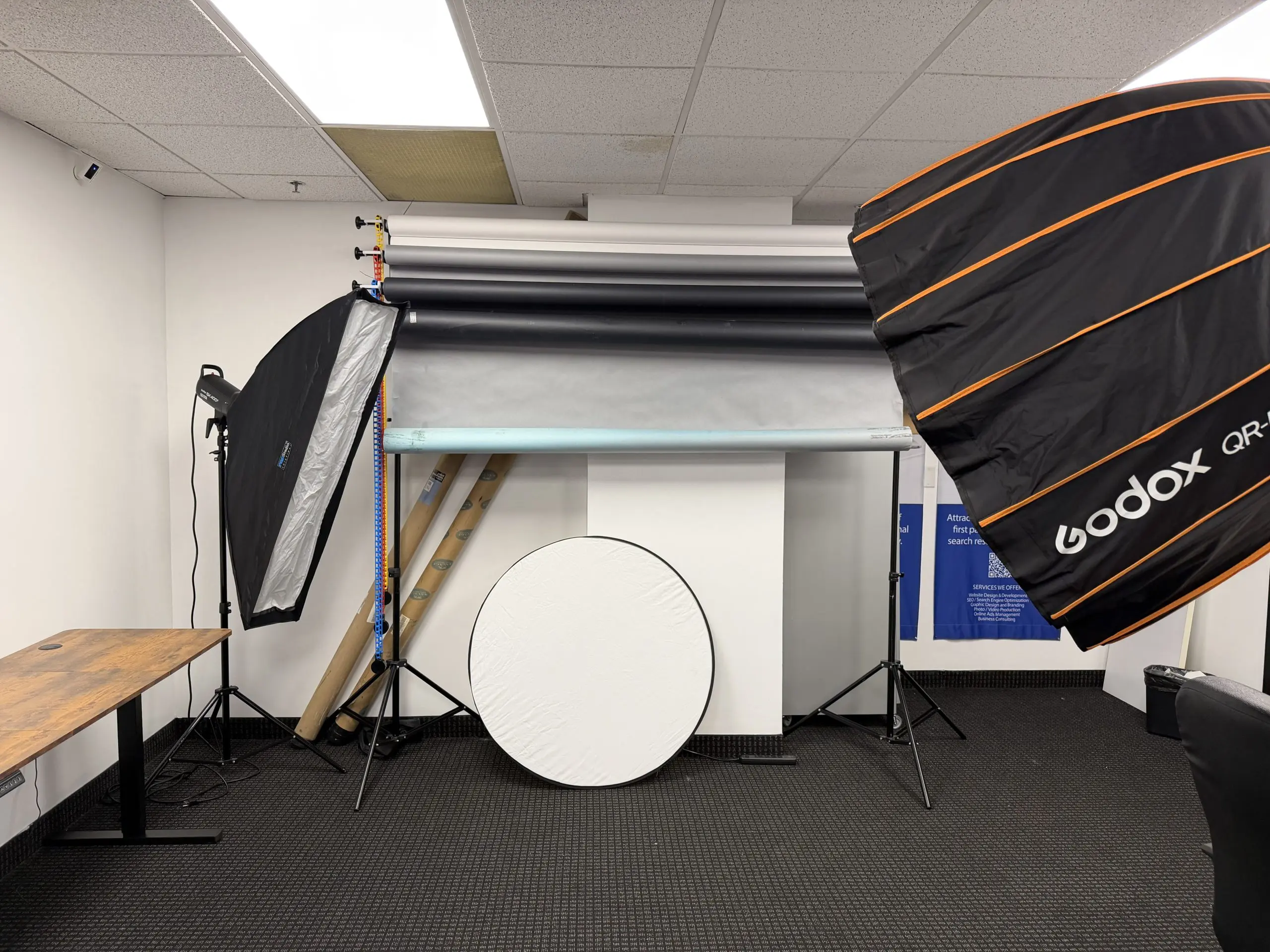 Photography studio with lighting and backdrops