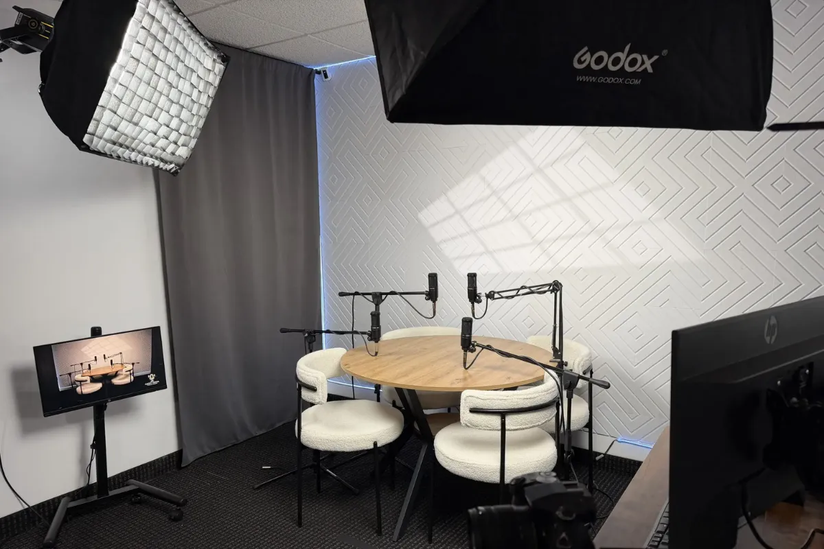 Professional podcast studio with microphones and lighting