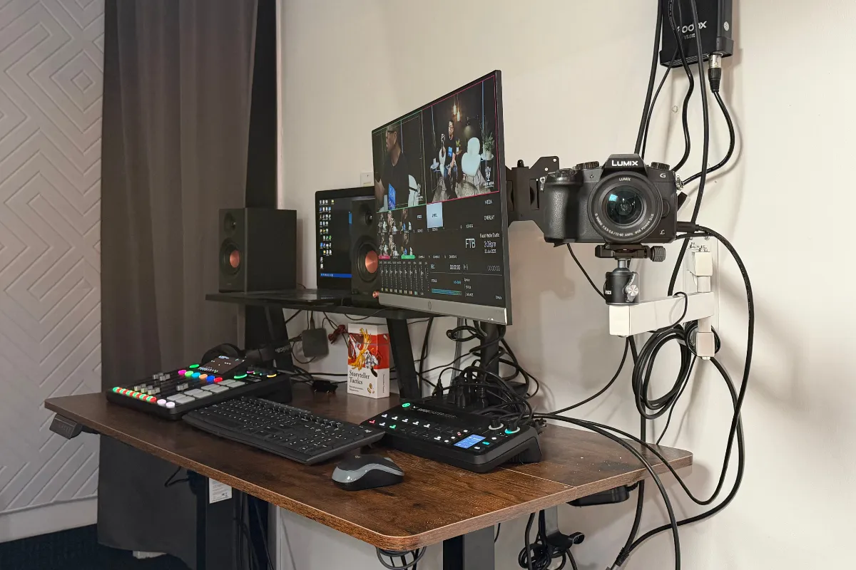 Professional podcast production desk with camera and audio equipment